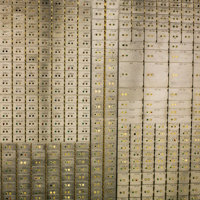 Wall of safe deposit boxes.